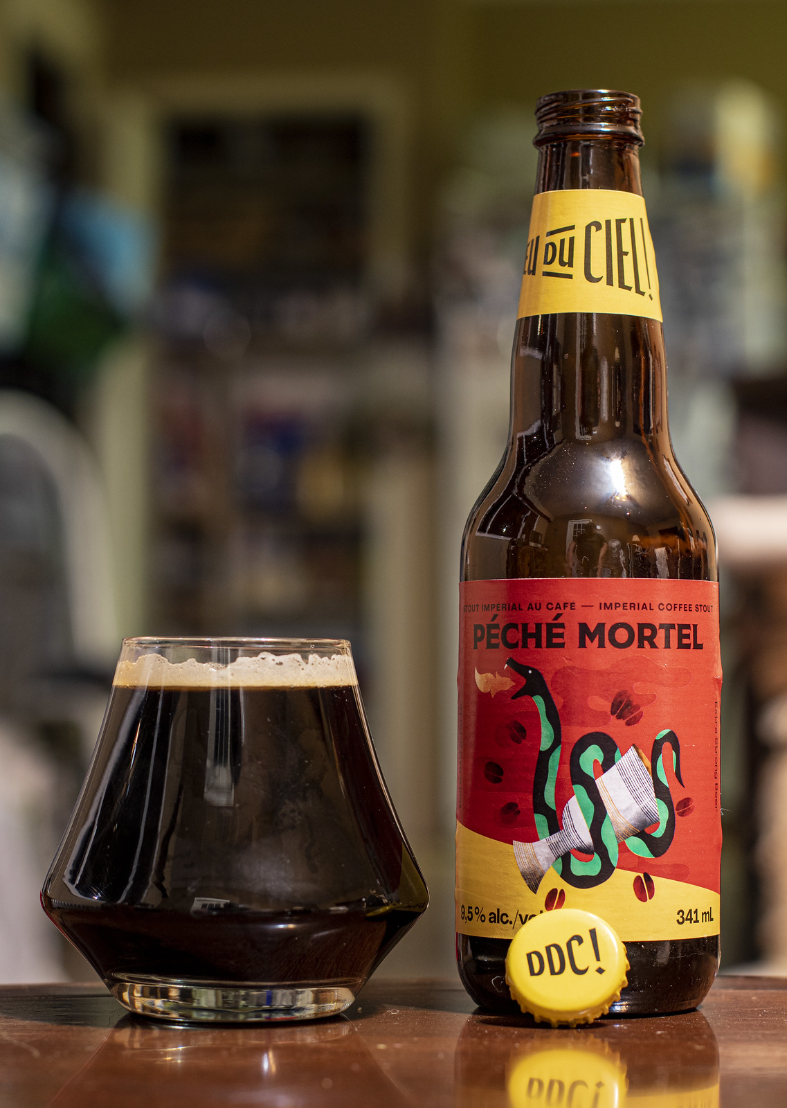 Image of a beer glass with the distinctive dark color of Imperial Stout - Péché Mortel - Bourbon: The History of a Work of Art