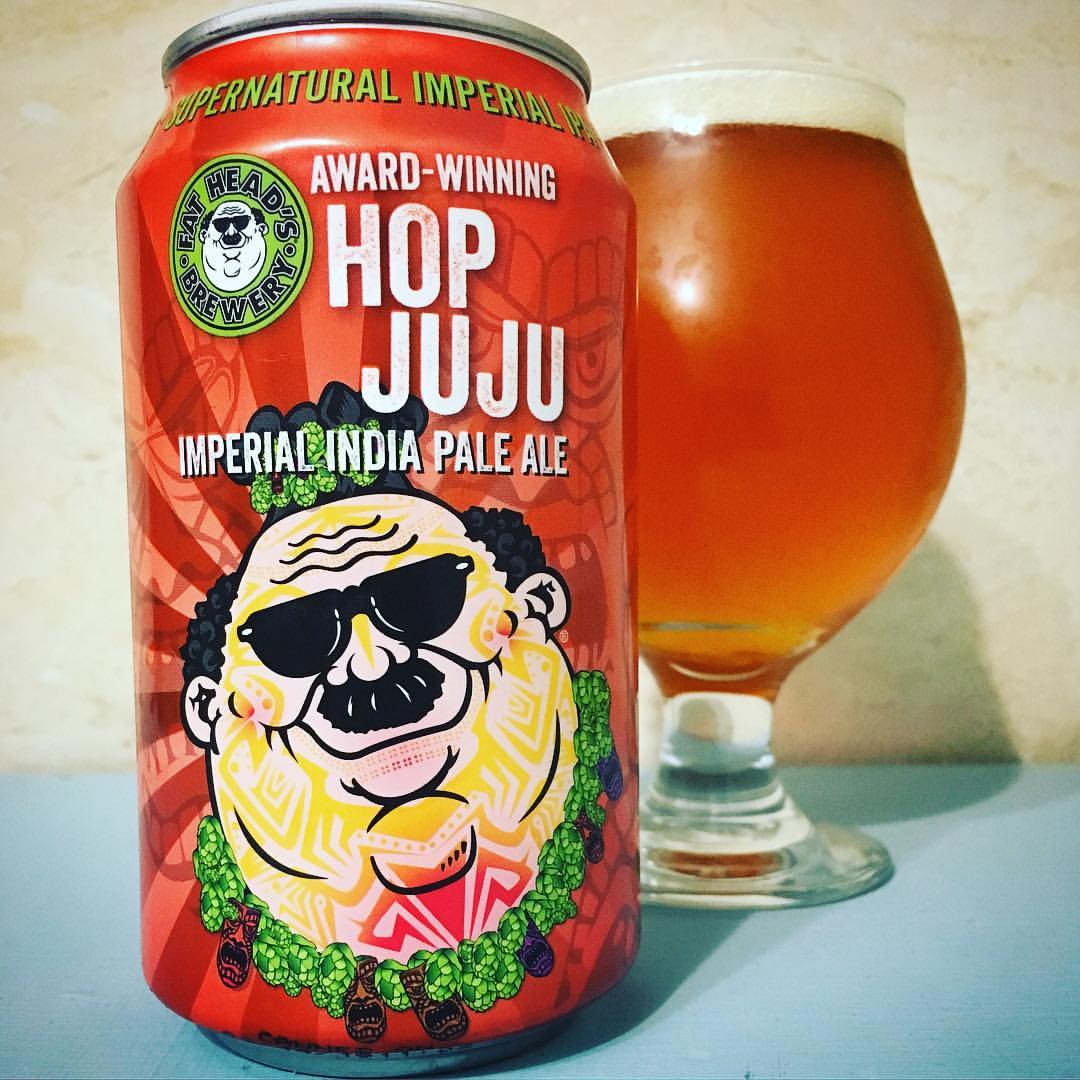 Hop JuJu beer glass with a layer of white powder shows the freshness of the beer - Hop JuJu: The Breakthrough of Imperial IPA Flavor
