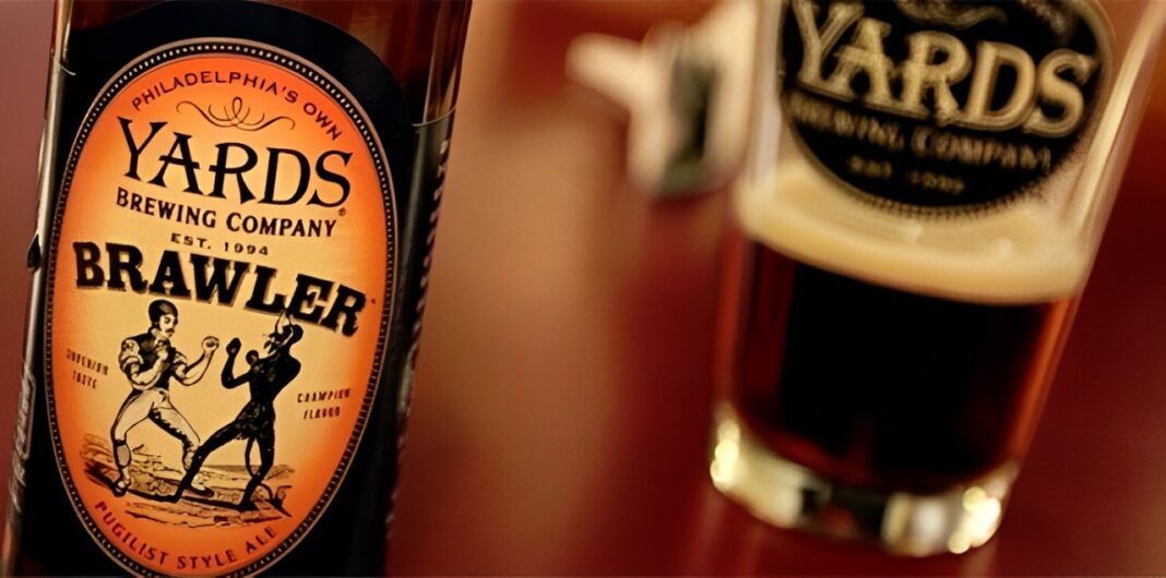 Photo of a rich, dark brown bottle of Brawler Champion Ale with a crisp Yards Brewing Co. label