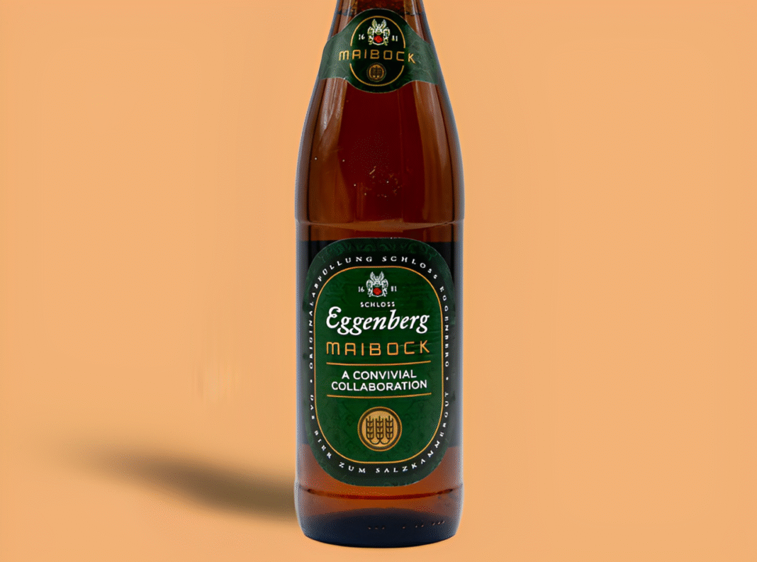 Ein klares Foto einer Maibock Eggenberg-Bierflasche mit ihrer charakteristischen goldenen Farbe, dem Symbol des traditionellen österreichischen Biers. Ein klares Foto einer Maibock Eggenberg-Bierflasche mit ihrer charakteristischen goldenen Farbe, dem Symbol des traditionellen österreichischen Biers.