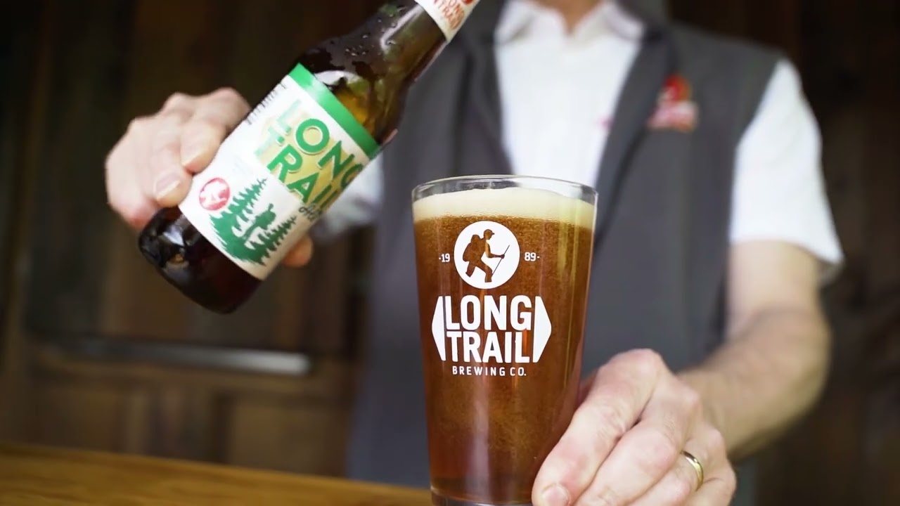 Long Trail Ale: German Altbier Tastes Breathed Into Vermont Long Trail Ale Beer Glass with Sparkling Beer in a Glass Stange - Long Trail Ale: German Altbier Taste Breathed Into Life in Vermont