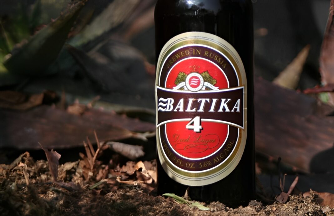 Baltika #4 Original Dark beer bottle with mysterious black color, stands out in the light