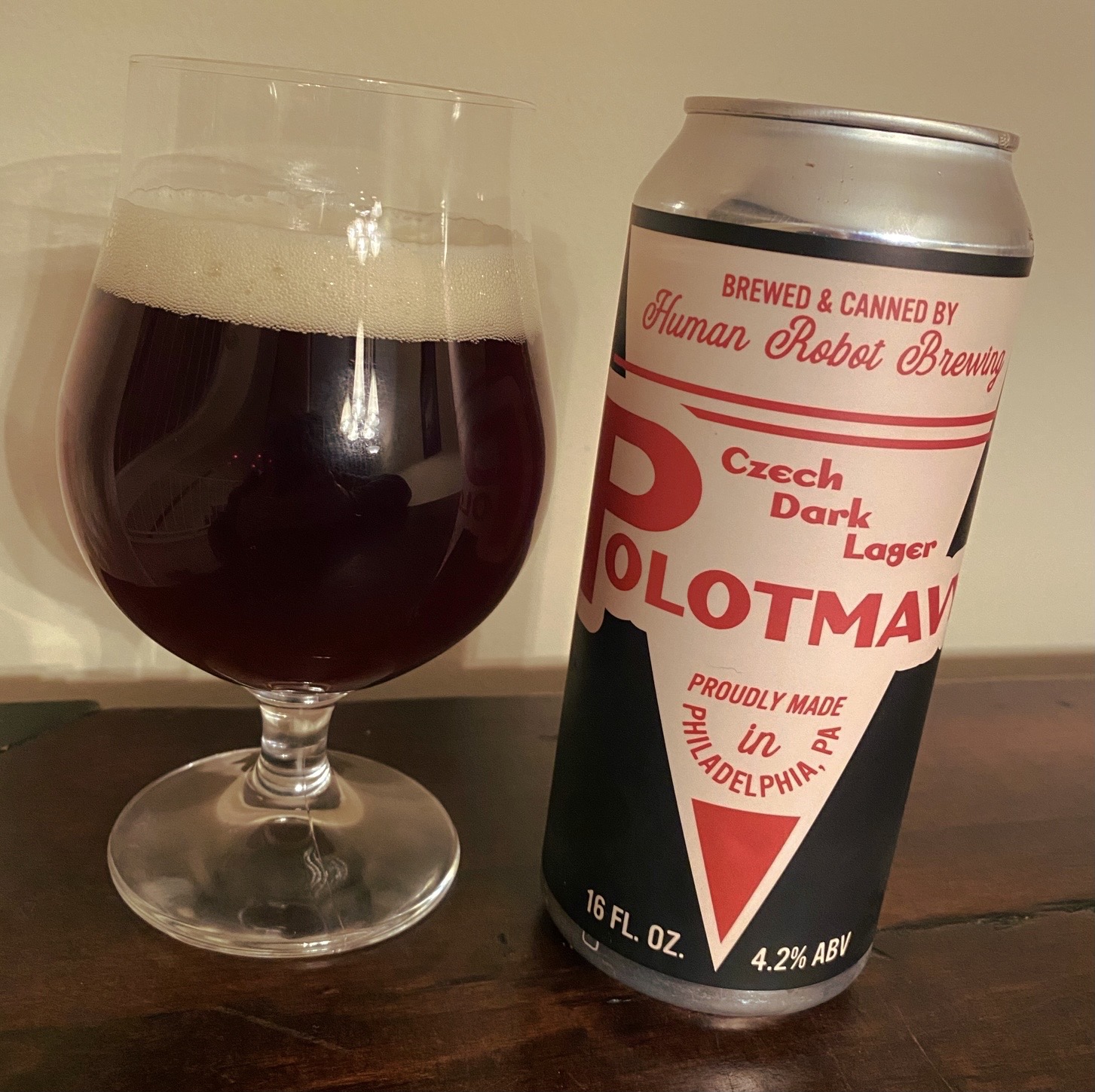 Polotmavy 12° beer glass with its distinctive red color and powder layer clearly shows the unique taste of Czech Amber Lager - Polotmavy: The Creative Czech Beer Story