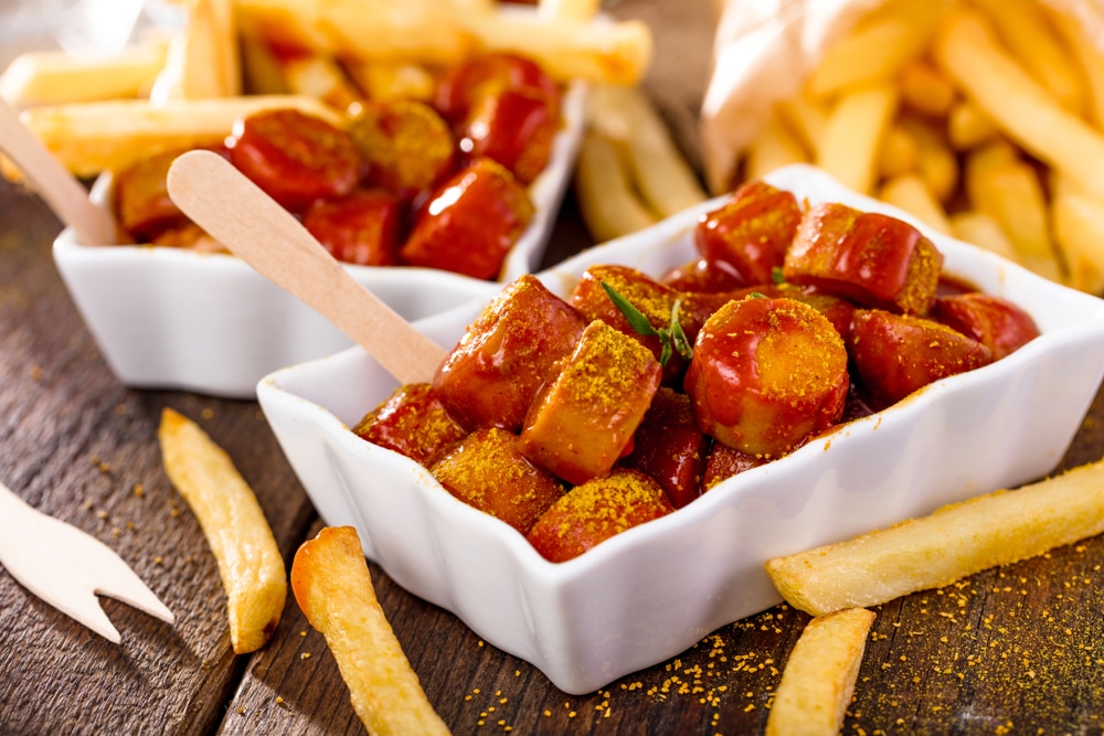 Traditional German Currywurst pairs perfectly with the bold taste of Doppelsticke - Doppelsticke – The German Beer Signature