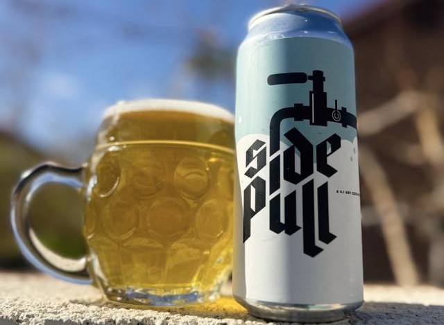 SRM 3–6 Light Beer with amber color, chilled in a small glass, the honey-golden fields of Bohemia - Side Pull: The Essence of Czech Lager in Every Drop of Straw