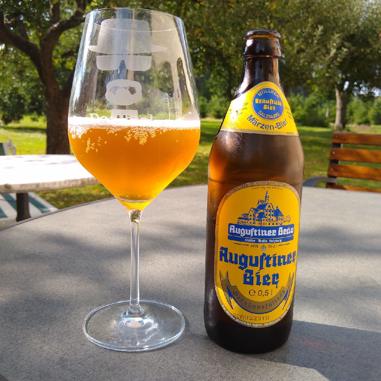 Warm amber beer reminiscent of autumn leaves on Mozart Square - Augustiner Bräu Märzen Bier: 400 Years of Golden Taste