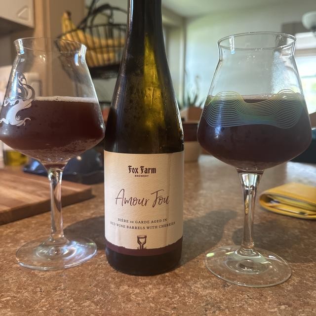 Amour Fou: The Essence of Bière de Garde From Fox Farm Brewery - A beer with a clear amber color that is as dark as the sunset on the French countryside.
