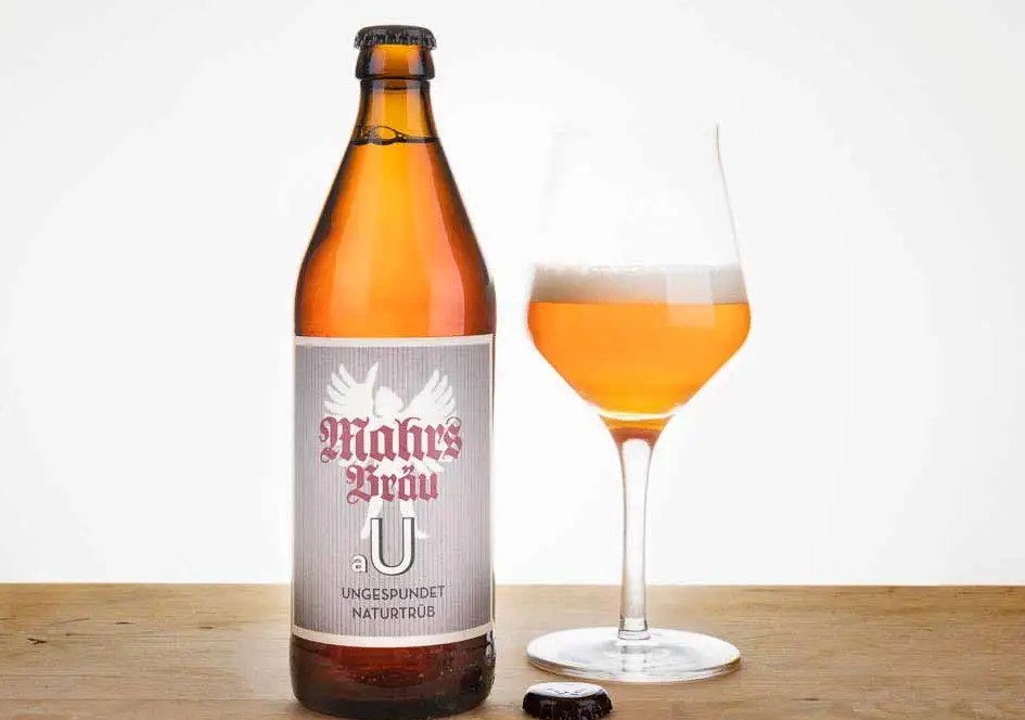 Kellerbier Ungespundet-Lager: Historischer Untergrund Dieses Bier hat eine natürliche goldene bis bernsteinfarbene Farbe, die ein Gefühl von Fülle und Kühnheit hervorruft - Kellerbier Ungespundet-Lager: Underground History
