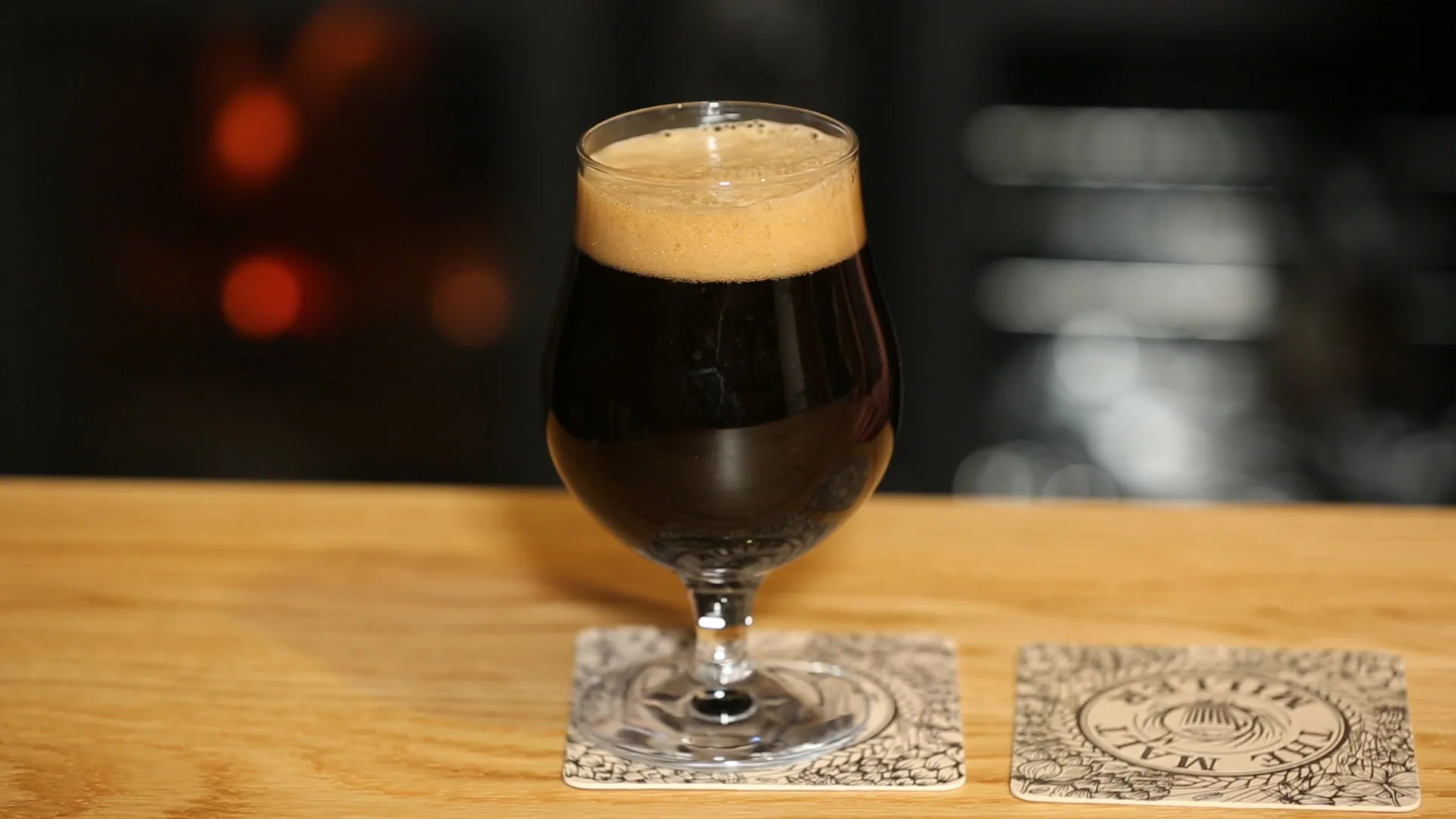 Fore Smoked Stout beer glass has a dark color with a light powder - Fore Smoked Stout: Light up the Fire of Taste