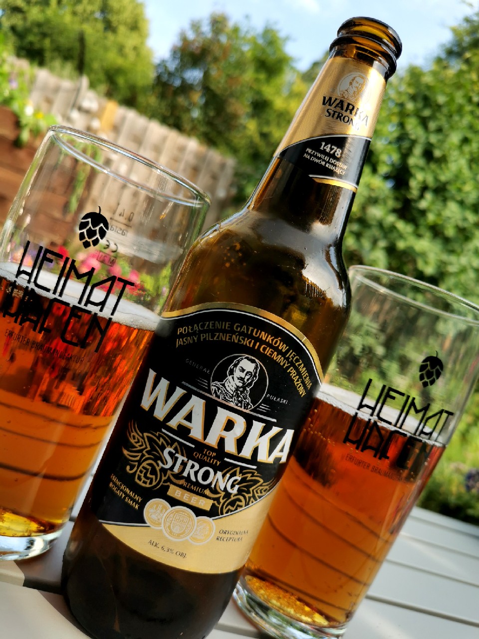 SRM Tua color is like a sunset on the river, from the golden light to the amber color behind the village. Warka Premium has a striking amber color - a color of the depth of deep love or - Warka Premium (Strong): The Door Through Time to the Past