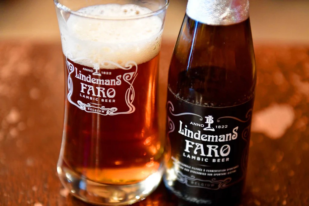 The color is reminiscent of caramel balls melting in the golden sunlight, promising a dreamy experience - Faro Lindemans: Heavenly Yeast and 200-Year-Old Secrets