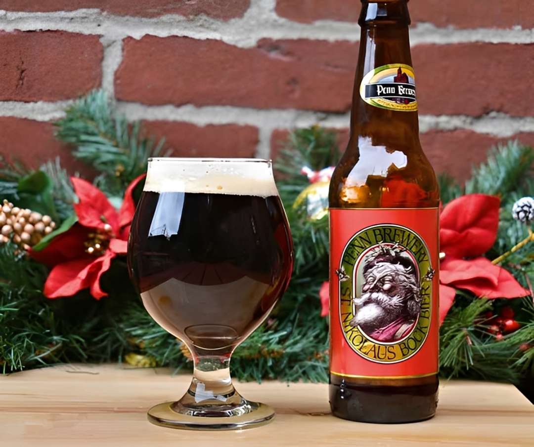 The beer reflects the afternoon light through the warm caramel-tinged amber layer, making the glass of beer sparkle like a winter gem - St. Nikolaus Bock Bier: The Intoxicating Doppelbock Masterpiece
