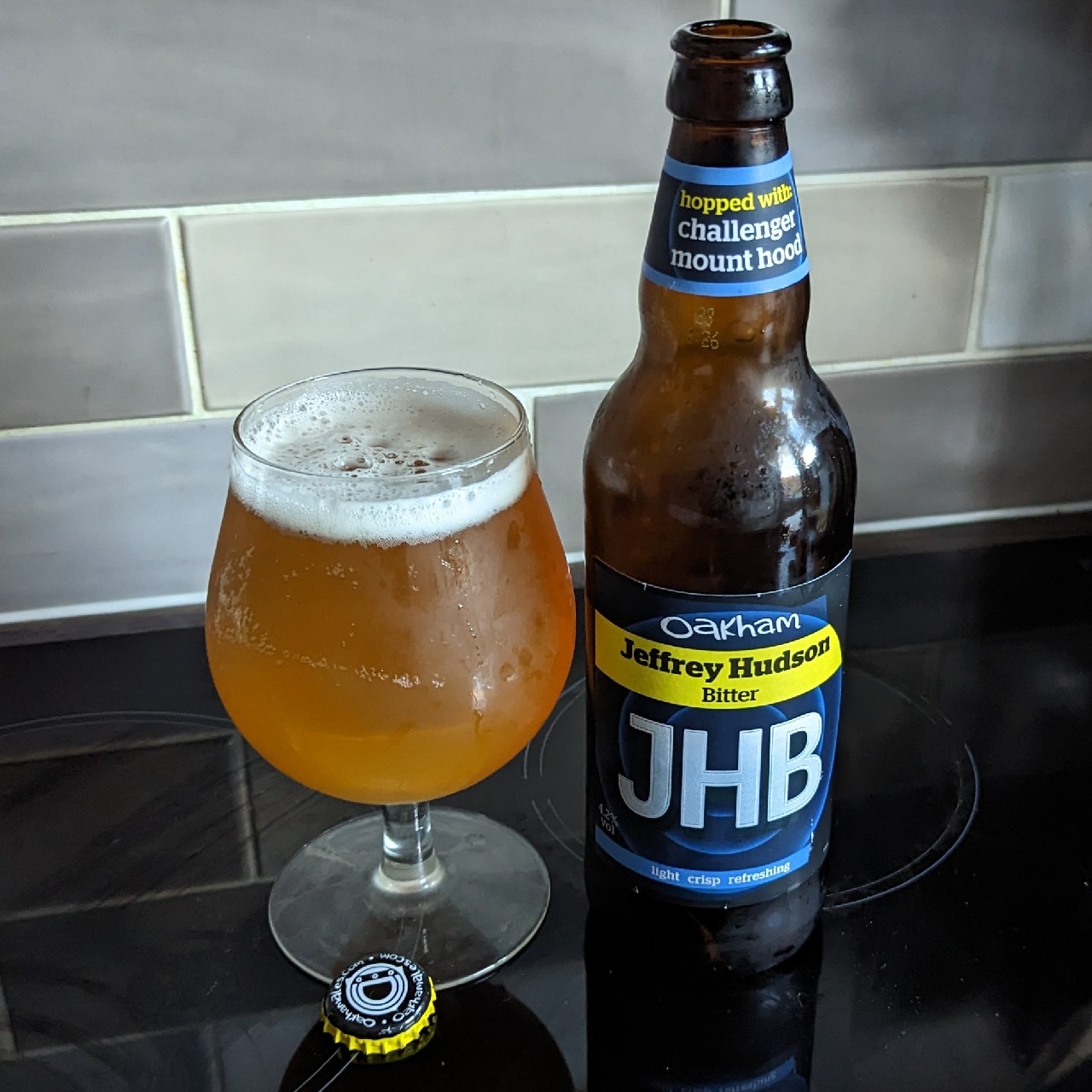 The beer has a warm golden color, mixed with a bit of mellowness in it, like early morning sunlight shining through an electrostatic glass - Jeffrey Hudson Bitter: The Essence of Pure British Beer