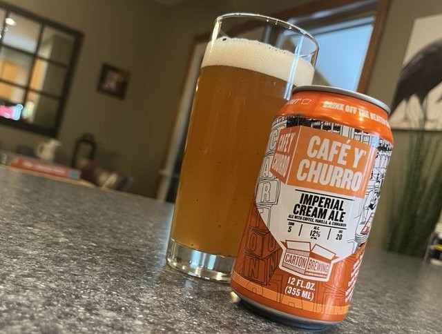 Beer with caramel color melting under the light of the darkest golden yellow - Cafe Y Churro: Beer Yeast Lulls the Soul with Sweet Taste