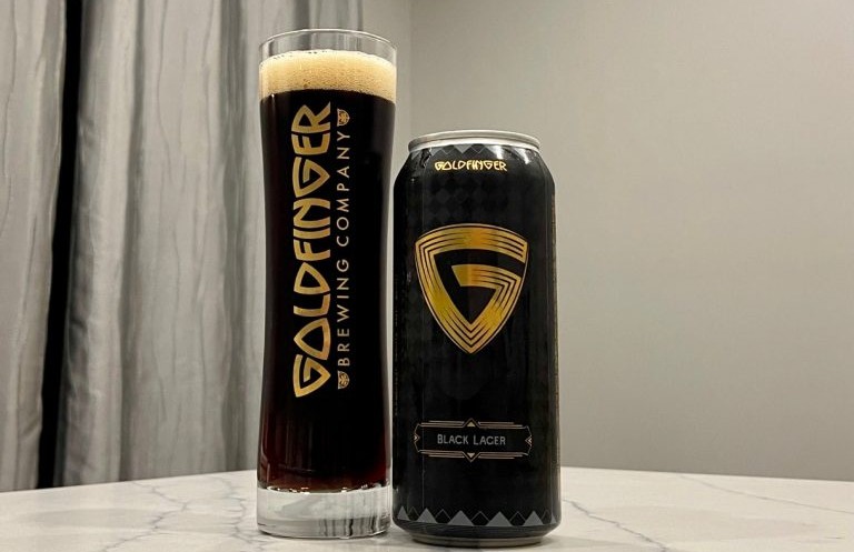 Black Lager has a mysterious beer can design with black and gold as the highlight - Black Lager: Journey From Darkness to Excellence