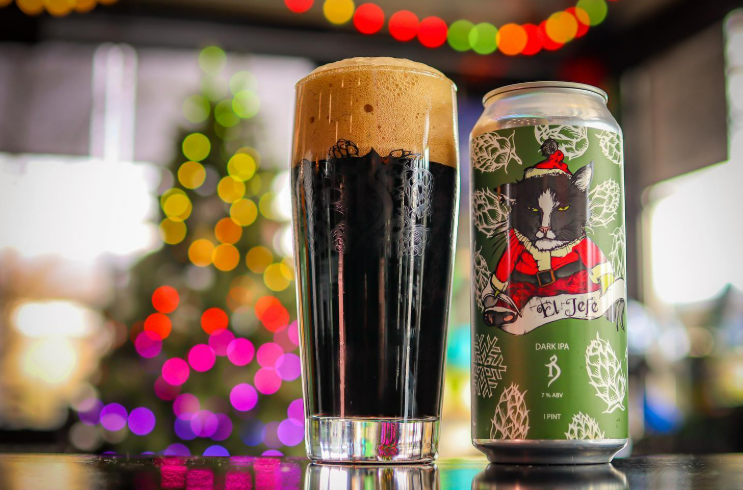 El Jefe wears a seductive black dress with a layer of powder on top - El Jefe: The Alchemist's Story of Unspoken Love