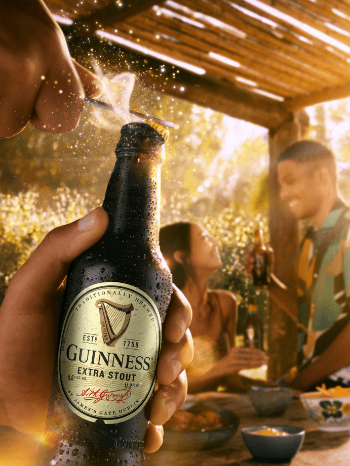 Guinness Extra Stout Original co thiet ke chai bia doc dao - Guinness Extra Stout: Kiệt T&aacute;c Đen Quyến Rũ Đốn Tim
