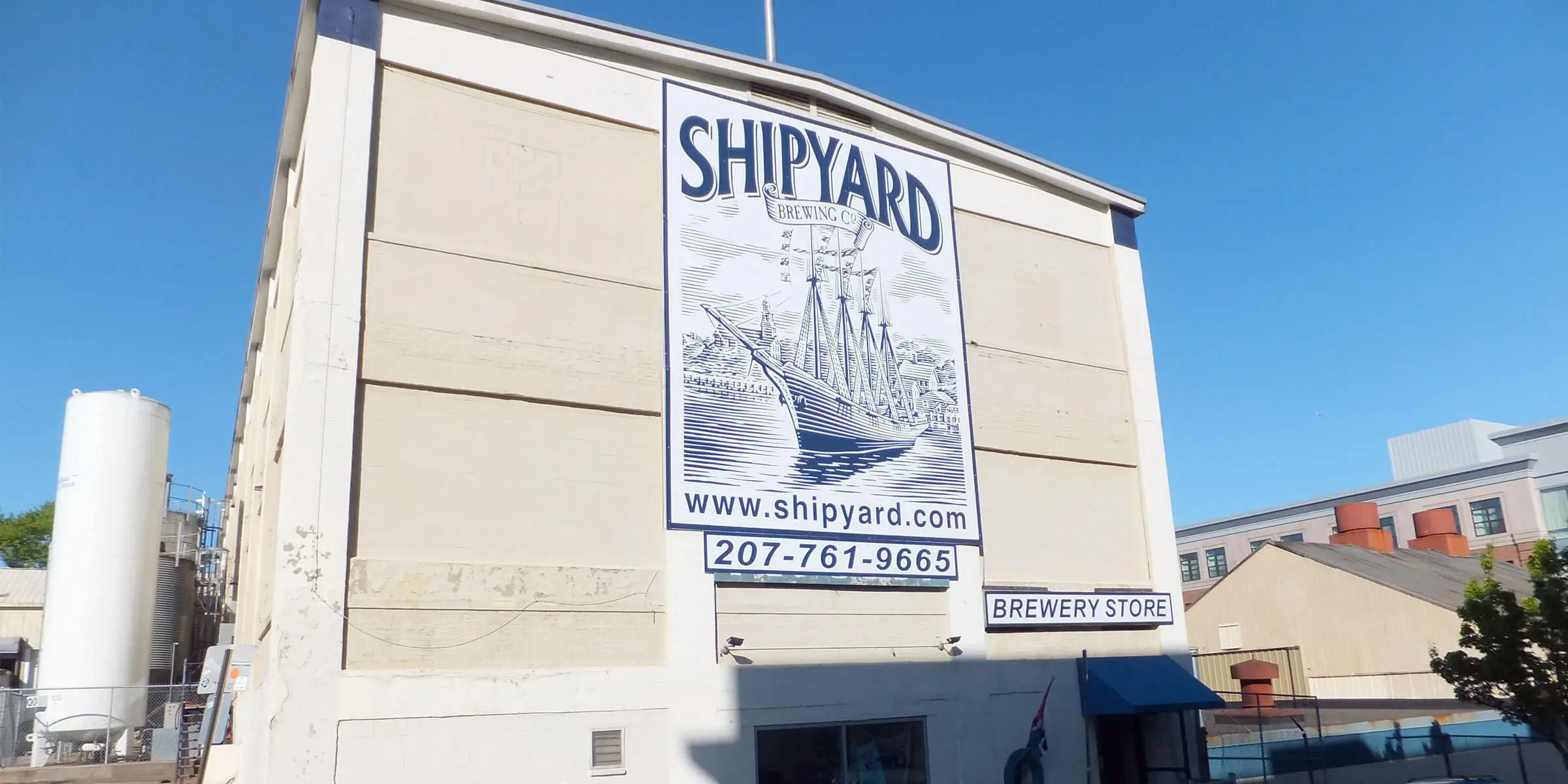 Exterior view of the modern Shipyard Brewing Company brewery - Pumpkinhead Ale: Autumn Stored in Every Drop of Gold