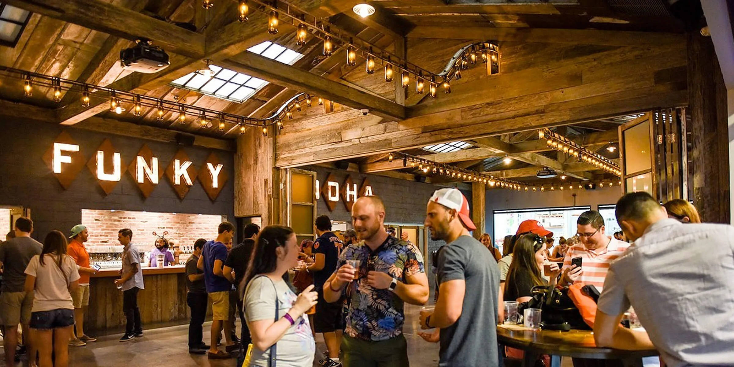 A cozy scene inside Funky Buddha Brewery - Morning Wood: Sweet Dawn Brewed in Wooden Barrels