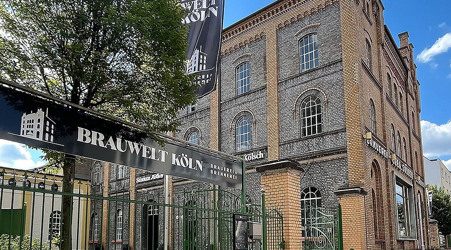 The exterior of the classic BRAUWELT Koln brewery - Mühlen Kölsch: The Soul of Cologne in Every Drop of Gold
