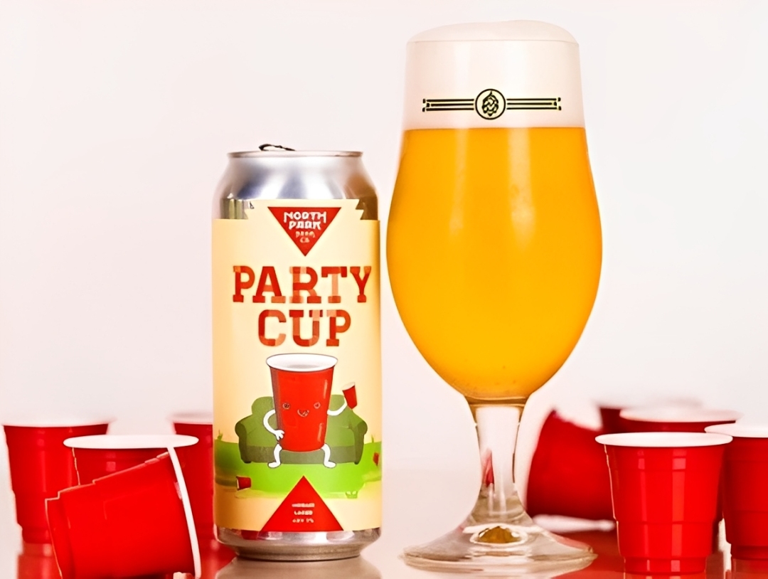The color of the beer is like the sun in San Diego - warm rum sparkling like amber under a layer of fine powder - Party Cup: Summer Love of Beer Connoisseurs