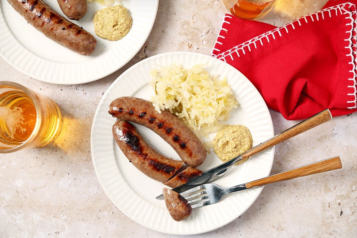 This flavorful Bratwurst is perfect to enjoy with this beer - Primus Weizenbock: A Masterpiece of German Beer in the Heart of Texas
