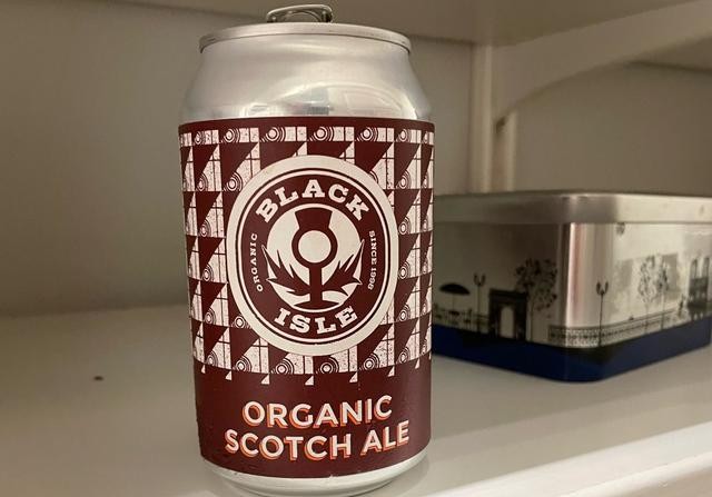 Organic Export Scotch Ale has a unique beer can design with two colors: white and red - Organic Export Scotch Ale: The Sweet Taste of Malt Fields