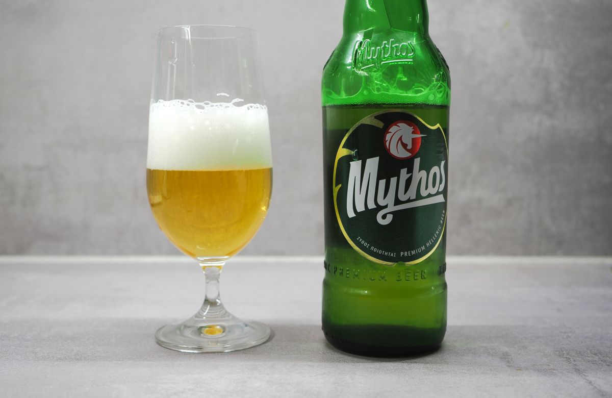 Beer has a warm, sparkling golden color like sandy beaches - Mythos: The Breath of the Mediterranean in Every Drop of Gold