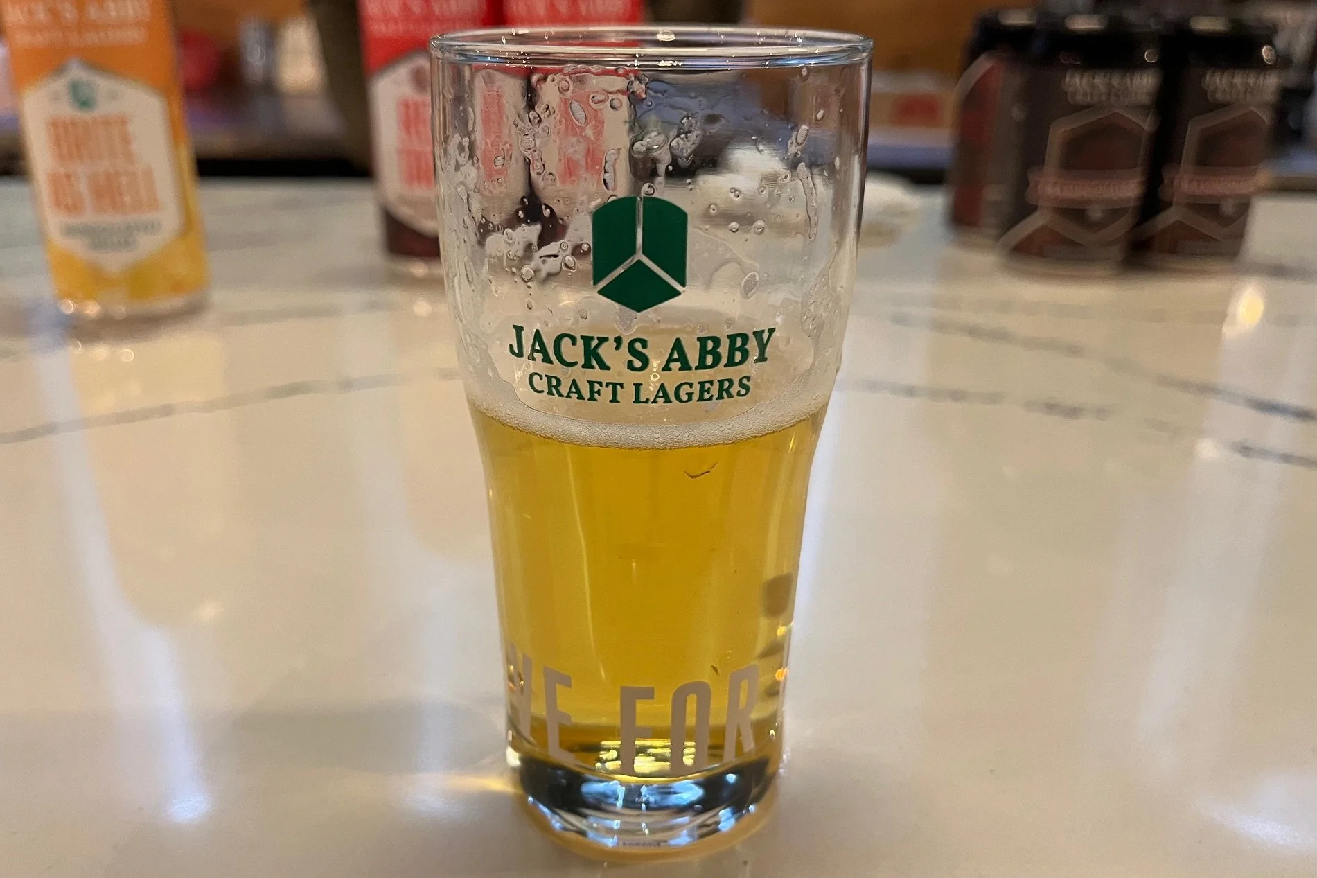 The beer has the darkest yellow color as pure as a drop of dew - Kogarashi: The Wind Whispers a Subtle Story