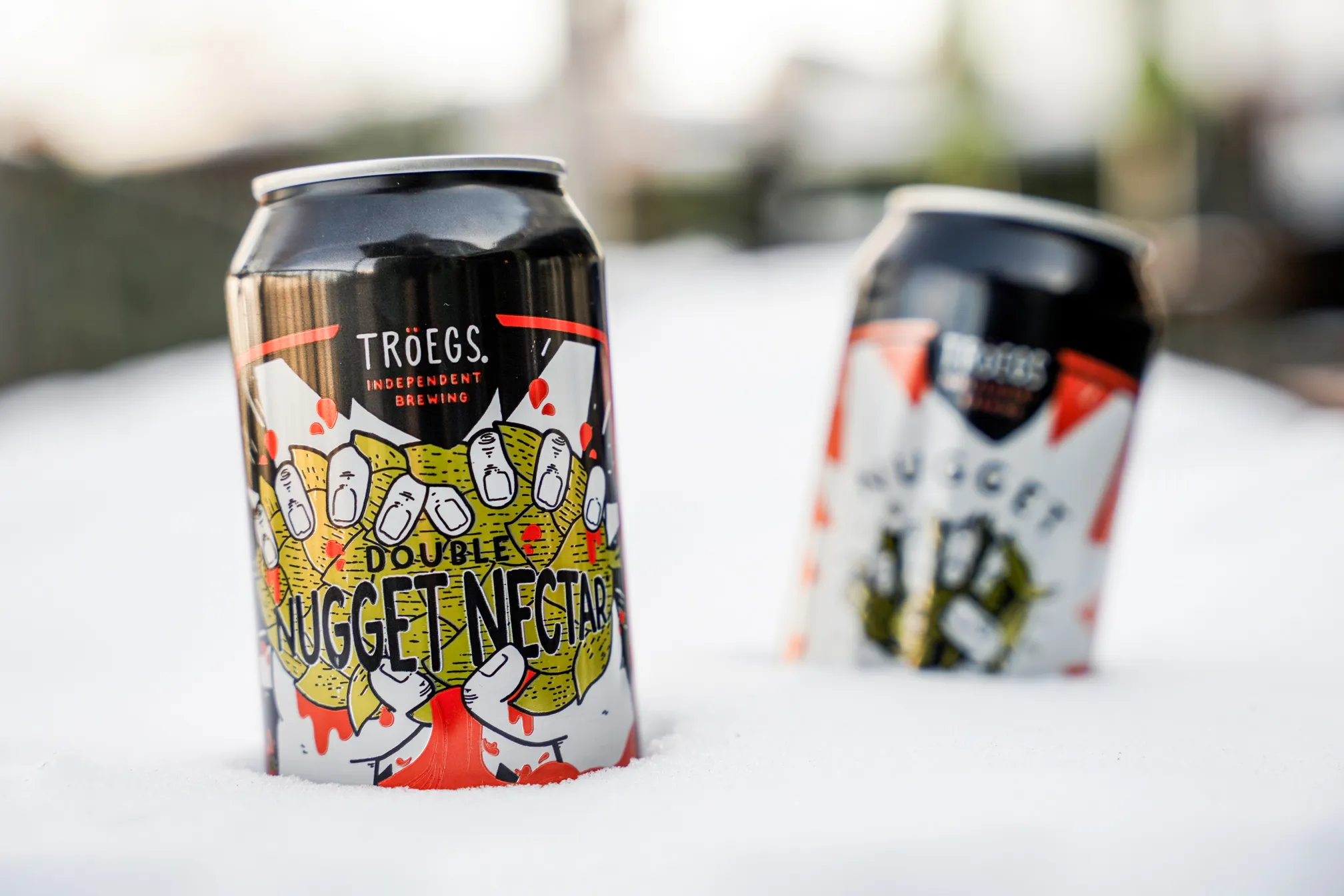 Double Nugget Nectar features a unique can design with the image of two masculine hands - Double Nugget Nectar: Immerse Yourself in Red Heritage