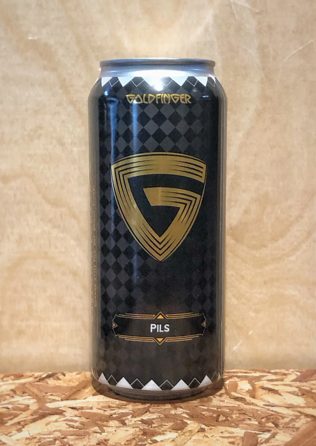 Goldfinger Pils features a minimalist design that subtly displays the logo and name of the beer - Goldfinger Pils: Flavors from Romantic Germany.