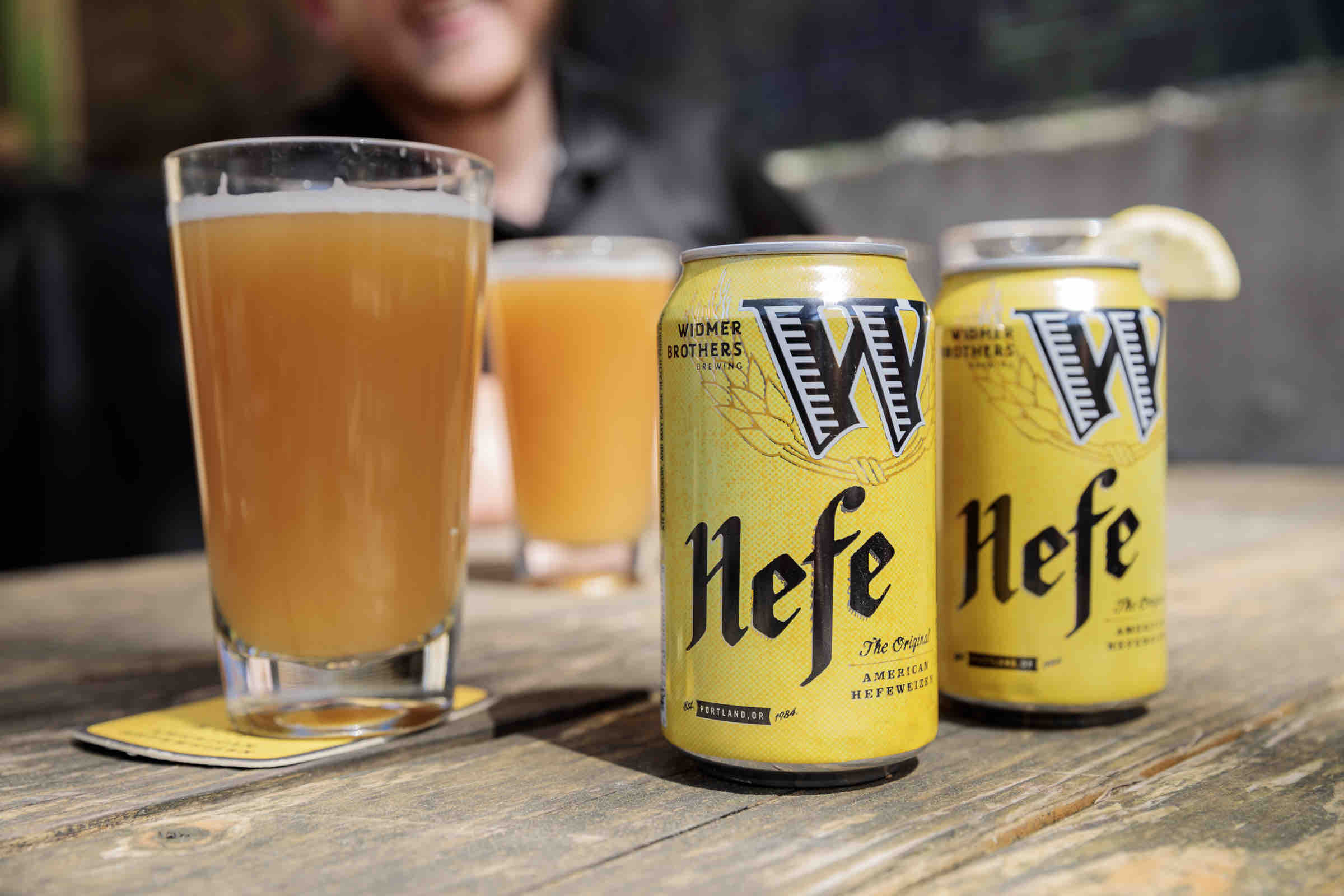Hefe has a striking orange-yellow design with a large logo - Hefe: Destiny Shakes the Beer Village