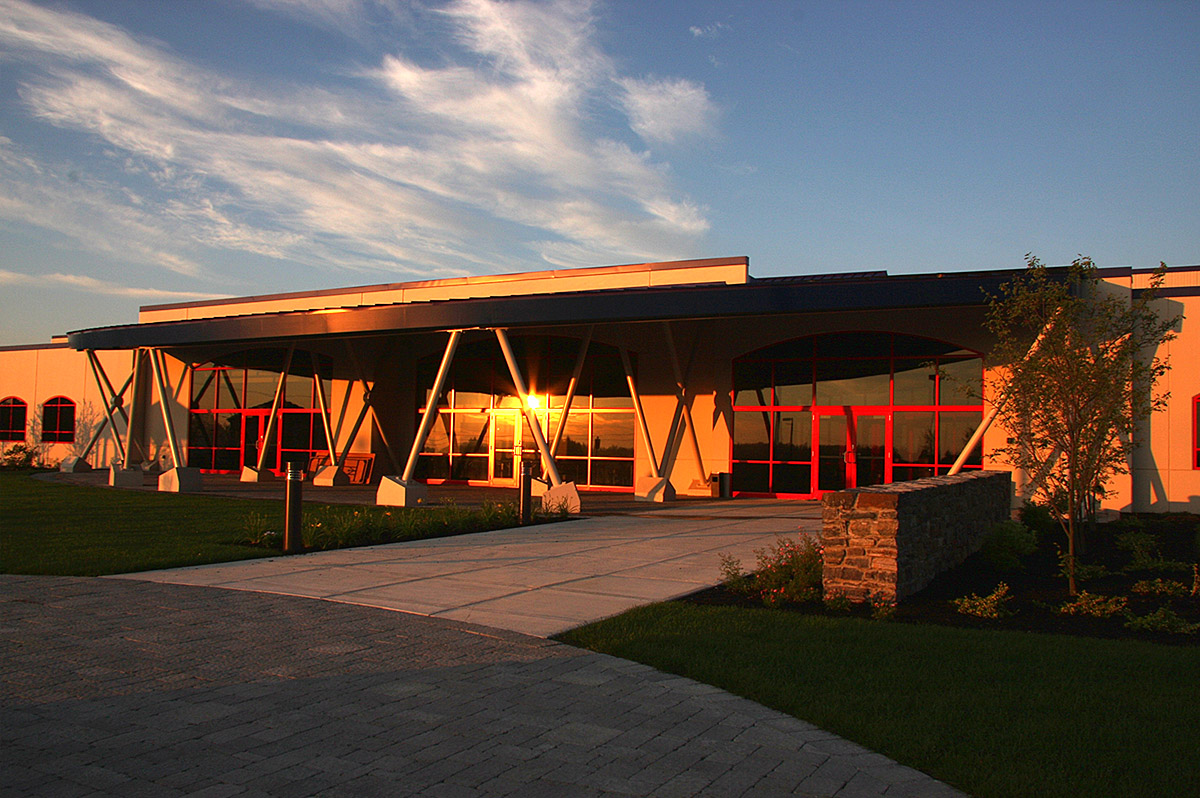 Picture of the outside of Peak Organic Brewing Company's brewery when the sunset came - Fresh Cut: A Crispy Masterpiece That Captures the Souls of Beer Connoisseurs