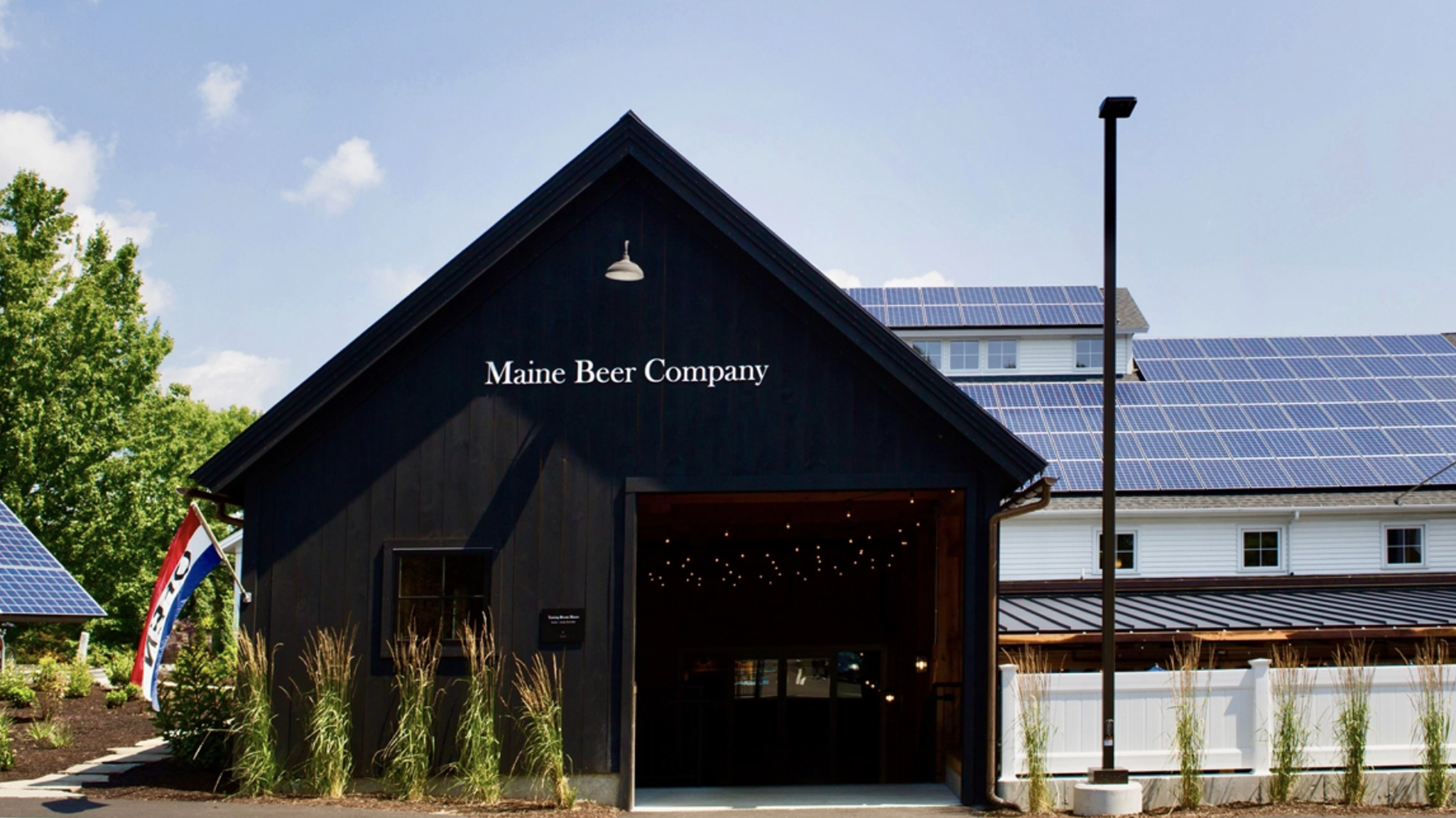Beautiful exterior images of the modern Maine Beer Company brewery - Prince Percy: A Flavor That Awakens the Conqueror's Spirit.