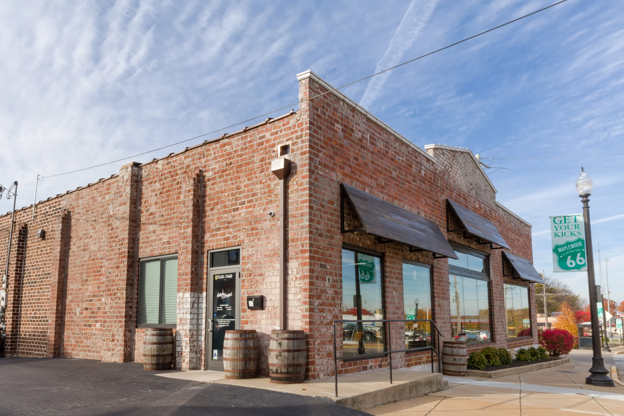 Side Project Brewing's exterior view of the scaled oak tree - Anabasis: The Oak Love Song Whispers the Story of Time
