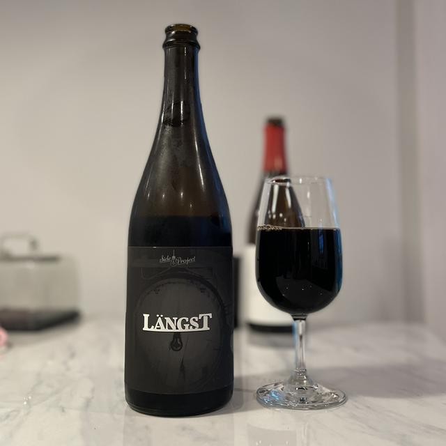 Langst has a unique and elegant beer bottle design - Langst: The Passionate Breath of Dreams Brewed in Wood