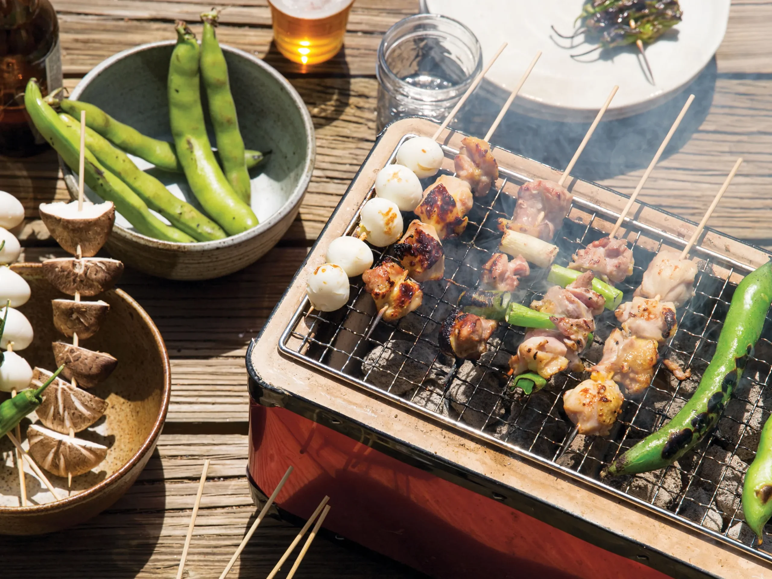 These steaming hot yakitori rolls are perfect to enjoy with this scaled beer - Hayabusa: California Sunshine in the Soul of Japan