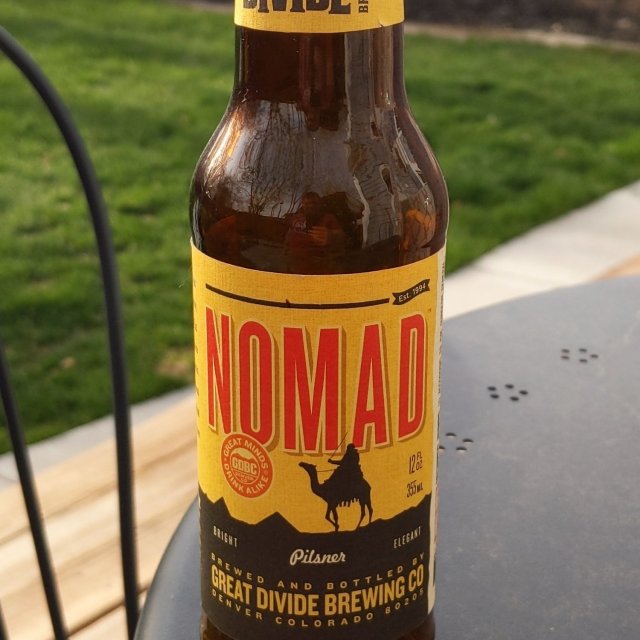 Nomad has an impressive golden design with the image of a lion - Nomad: Freedom & Purity In Every Awakening Sip