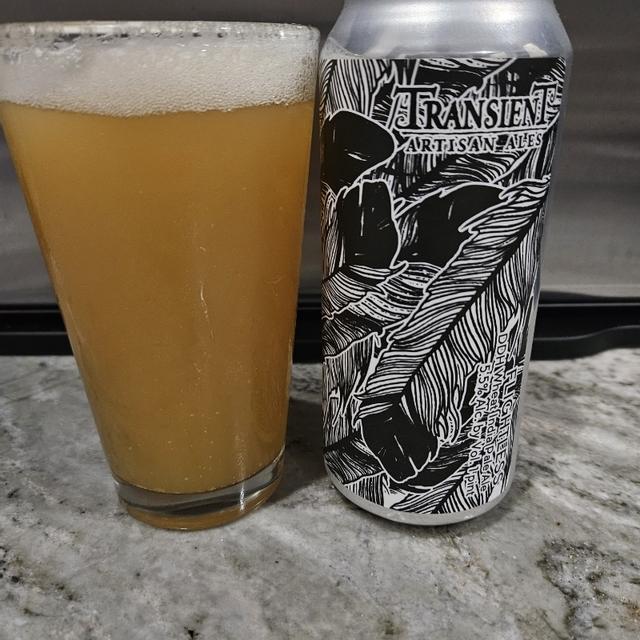 The beer has a dark rum color, its opening in the glass like a mist - Flightless: The Beauty of Flights That Don't Take Off