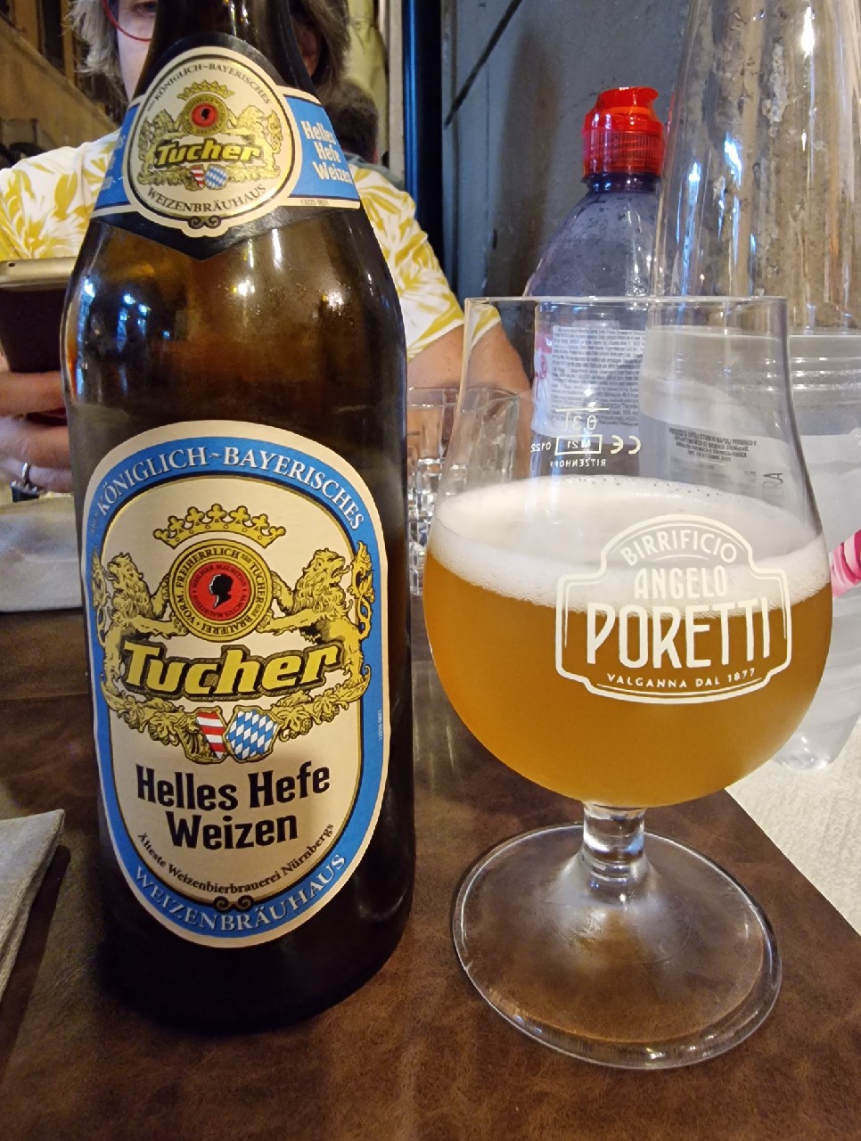 A bright, sparkling golden beer with a gentle amber accent - Tucher Helles Hefe Weizen: The Gentle River of Wheat