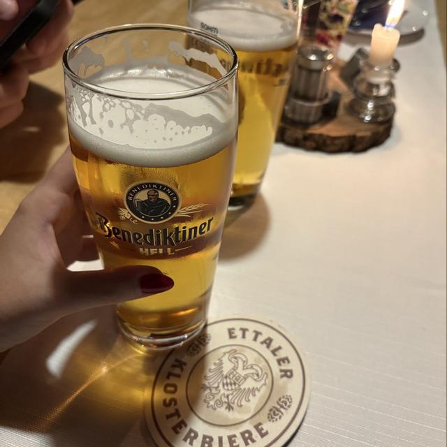 The beer has a bright golden color, so pure you can see through it - Benediktiner Hell: The Pure Soul of Bavaria in a Drop of Gold