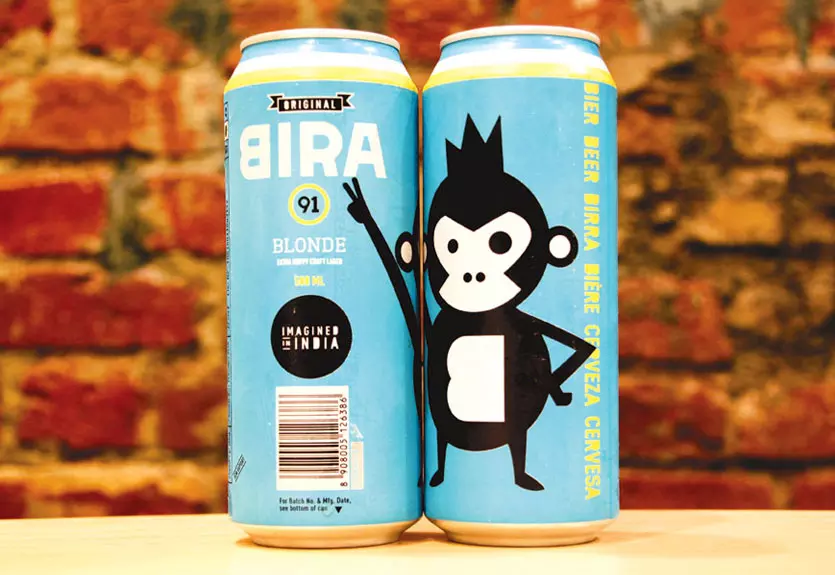 Bira 91 Blonde Lager has an impressive blue design and lovely cartoon image - Bira 91 Blonde: Golden Yeast Awakens All Senses