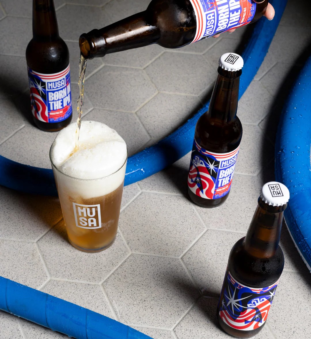 Born In The IPA has a unique color design with two impressive shades of blue - Born In The IPA: The Story of the Muse Musa