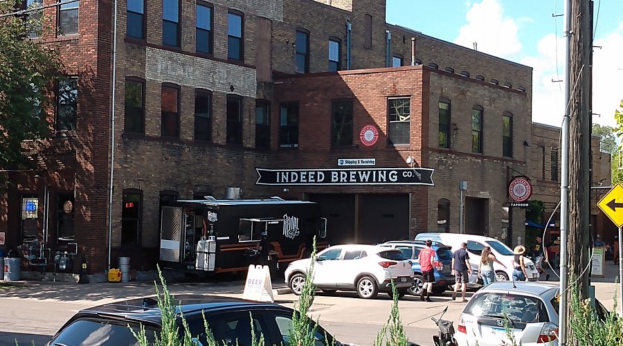 Image of the bustling animals outside Indeed Brewing Company Minneapolis - Strawberry Fields: Summer Variations in Every Drop of Gold