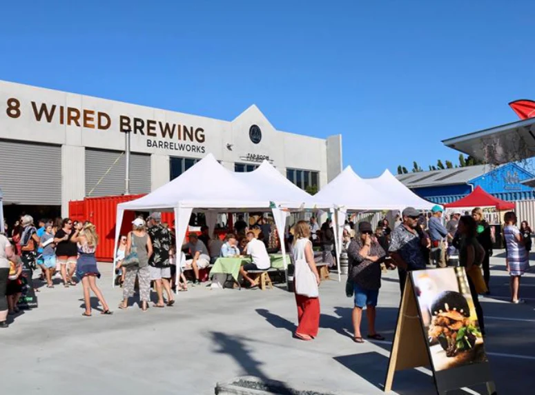 Pictures of the bustling crowd outside the 8 Wired Brewing Co. - Super Conductor: An Emotional Journey in Every Sip of Beer