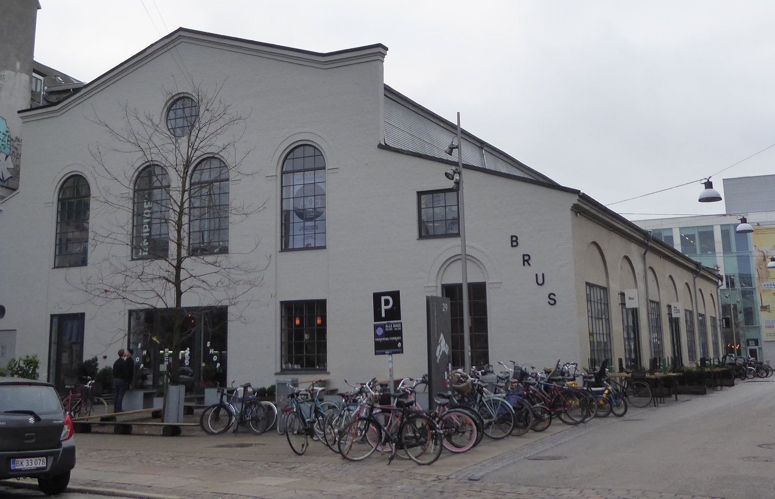 Picture of To Ol Brewery outside, lined with tourists' bicycles - Sort Mælk: Masterpieces from the Land of Danish Beer
