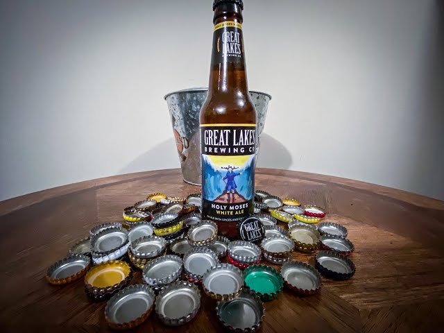 Holy Moses White Ale has a unique design with the image of a man walking on the road - Holy Moses White Ale: A Poem of Witbier in the Heart of America