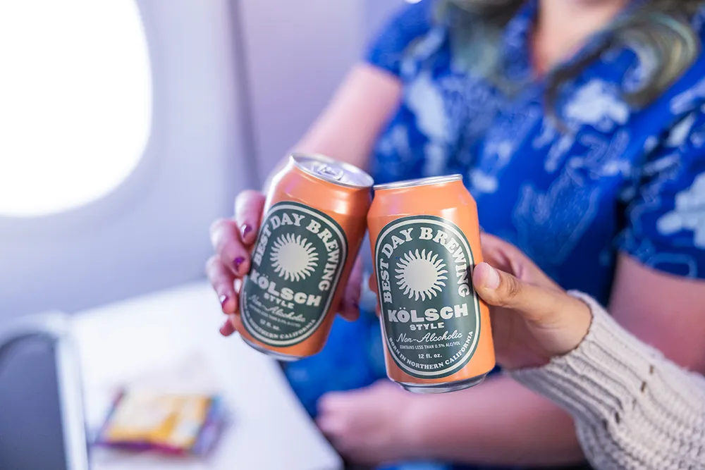 Kölsch: Endlosem Spaß Leben einhauchen Kölsch hat ein einzigartiges Bierdosendesign in orange-grüner Farbe - Kölsch: Endlosem Spaß Leben einhauchen