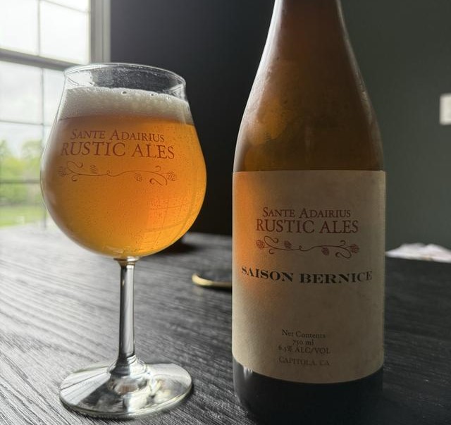 Beer has a warm, light golden color, sometimes tinged with a gentle amber hue - Saison Bernice: A Summer Waltz in a Glass