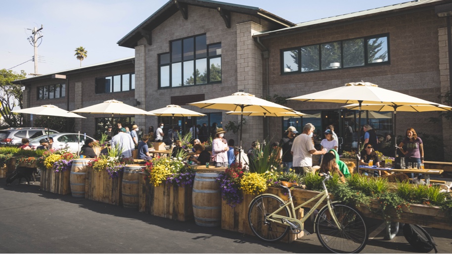Images of the Sante Adairius Rustic Ales brewery, bustling and vibrant, objective view - Saison Bernice: A Summer Waltz in a Glass